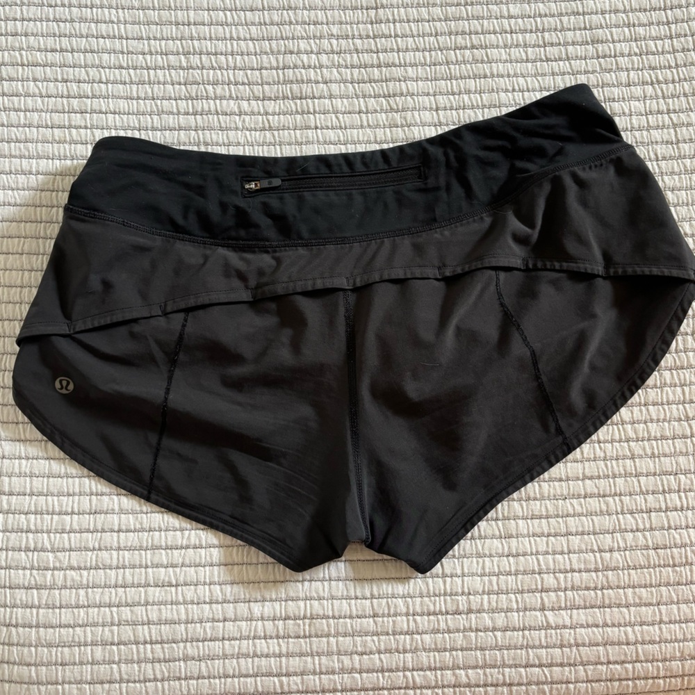 Black Lululemon Speed Up shorts- size 6. Inseam 2.5